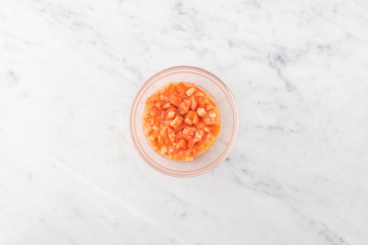 Prep and marinate tomatoes