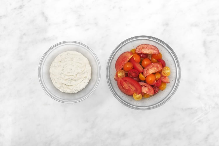 Make tomato salad and creamy herb sauce