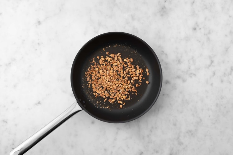 Toast peanuts and make salad