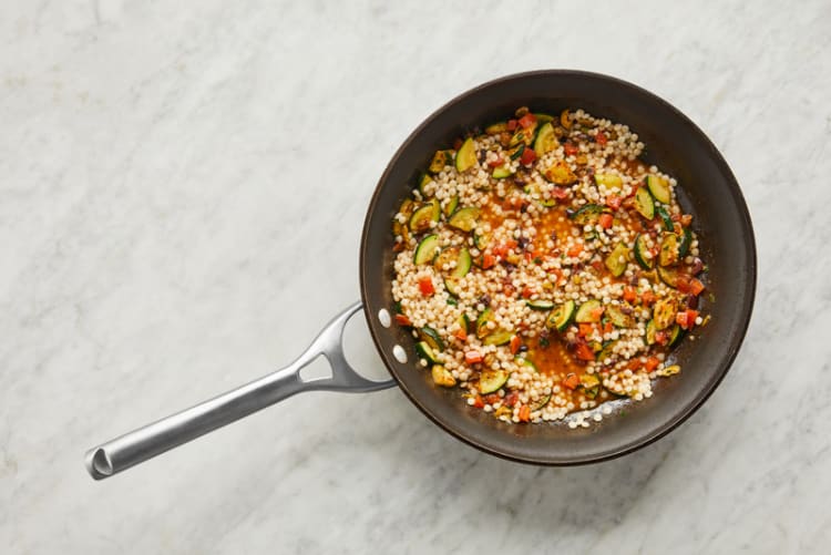 Cook veggies 