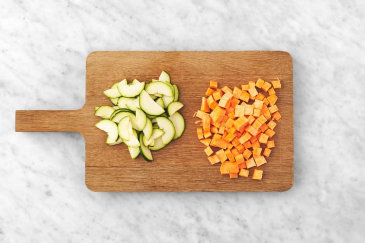 Boil water and prep veggies