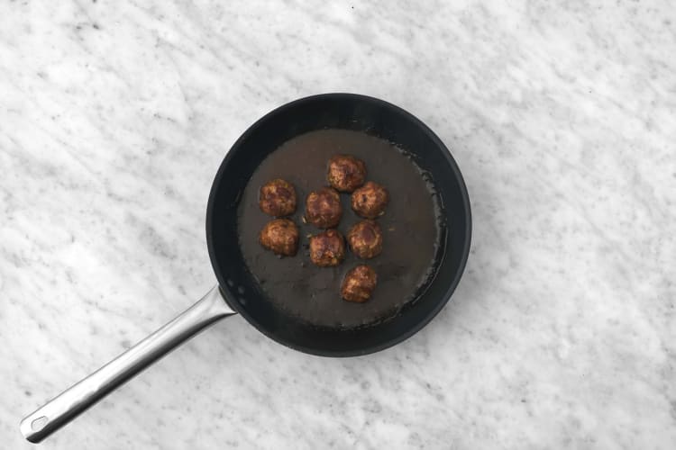 Finish meatballs in sauce