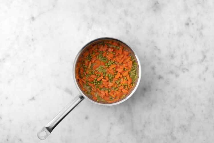 Prep and cook carrots and peas