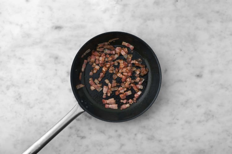 Cook bacon and make walnut crumble