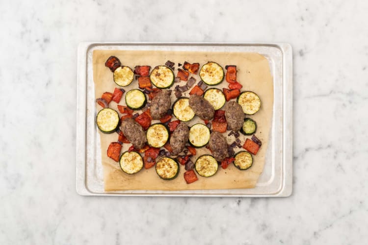 Bake veggies and Beyond Meat® koftas