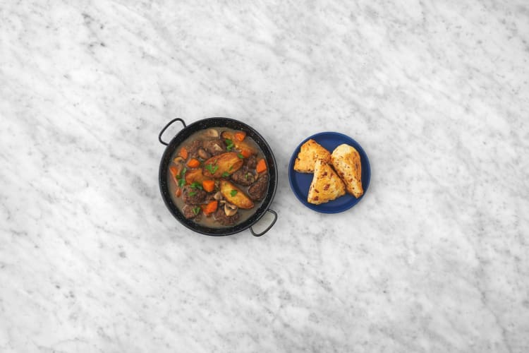 Bake biscuits and serve stew