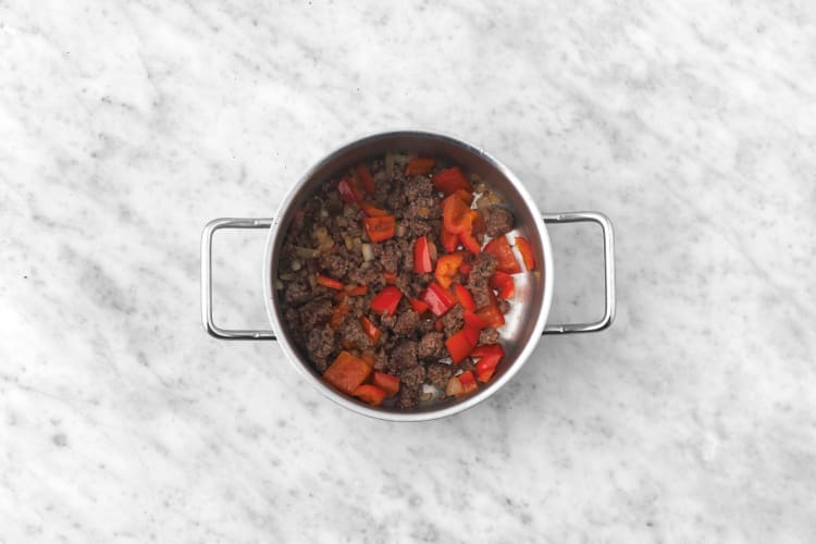 Cook chorizo and veggies