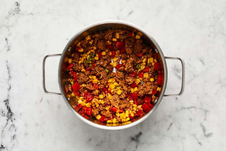 Cook veggies and chorizo