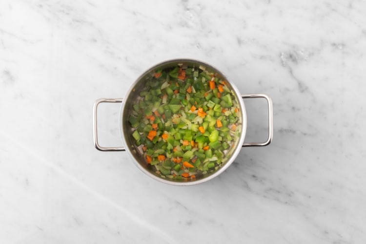 Cook chorizo and veggies