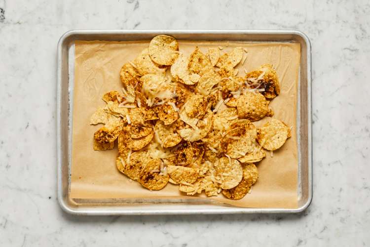 Bake tortilla chips and make pico de gallo