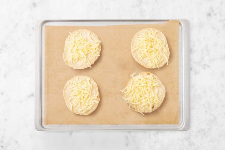 Toast buns and assemble melts