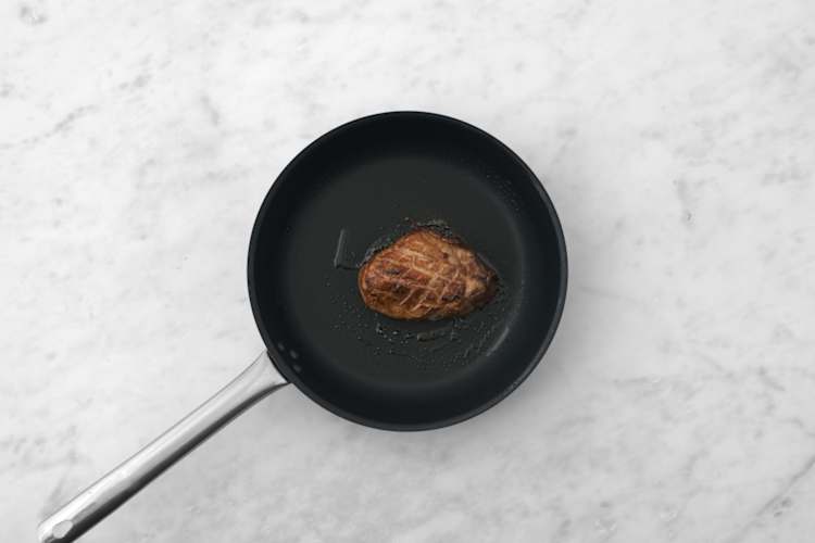 Sear the plant-based crumbed chicken