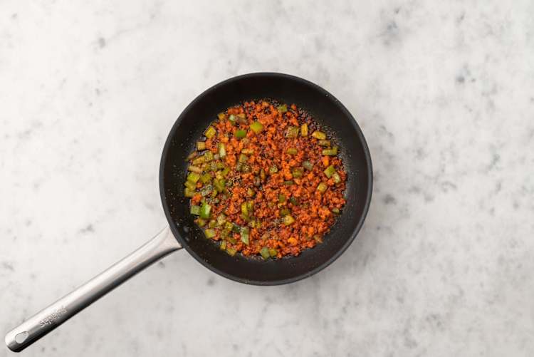 Cook chorizo and peppers
