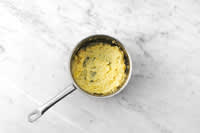 Make the cheesy mash