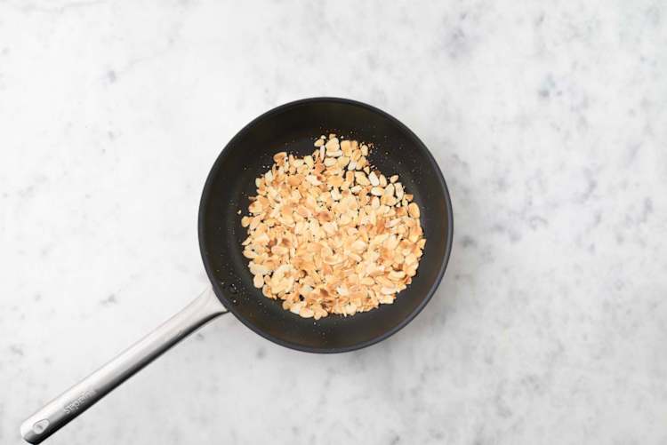 Toast almonds and make dressing