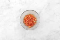 Season the tomato