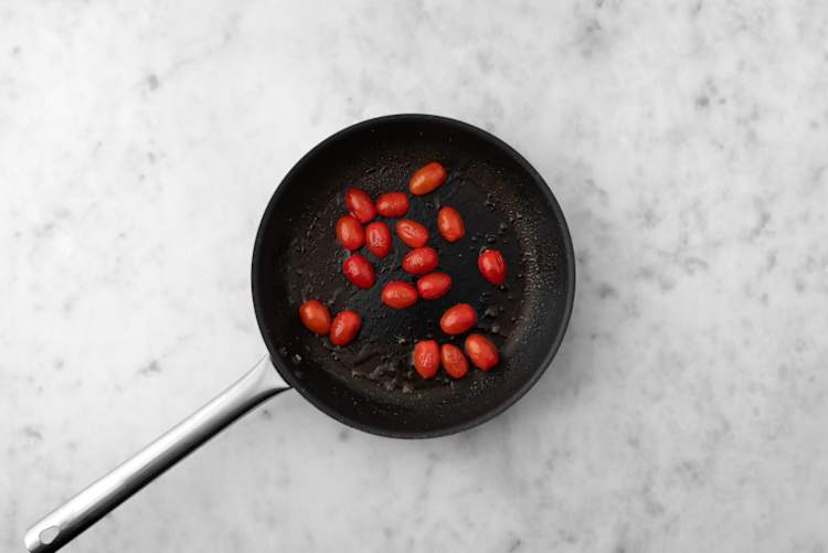 Cook shrimp and blister tomatoes