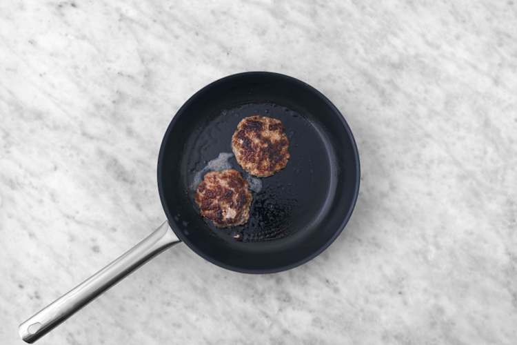 Cook bacon and patties