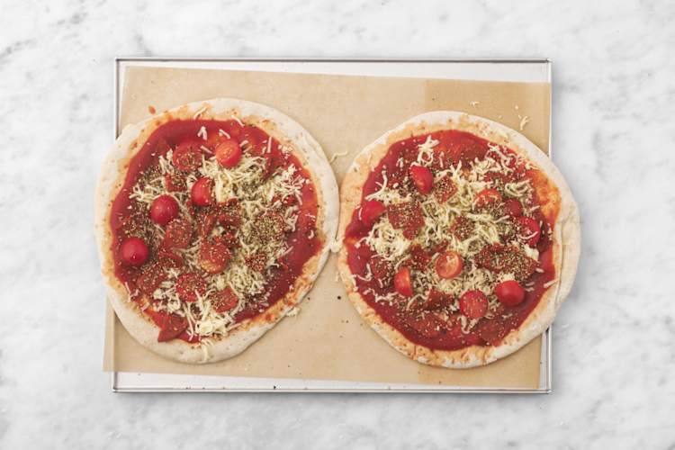Cubre las pizzas