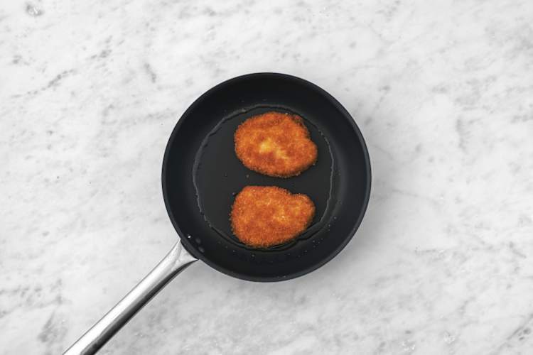 Cuocere la cotoletta