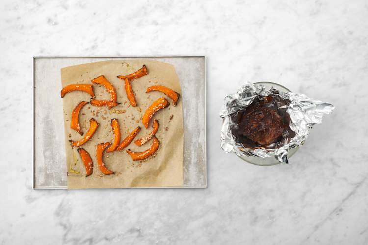 Roast the lamb and pumpkin