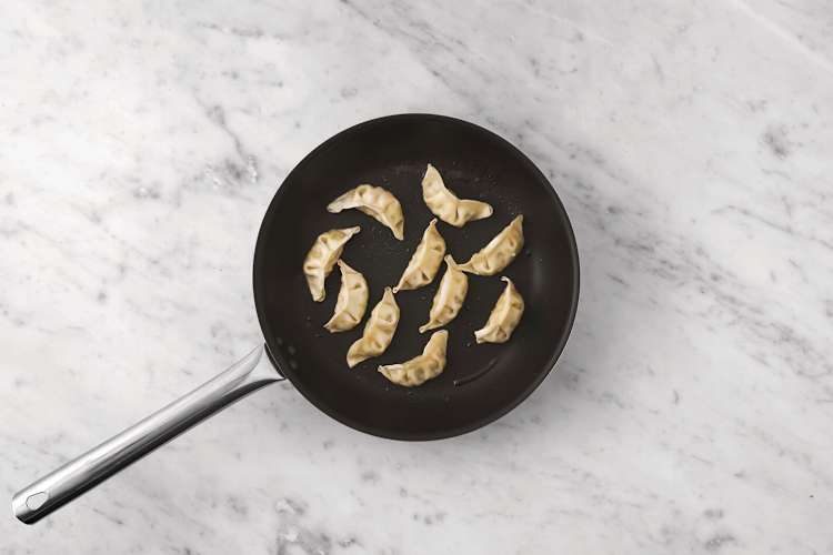 Cook the veggie gyozas