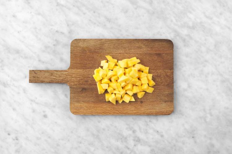 Forbered mango-smoothiebowl