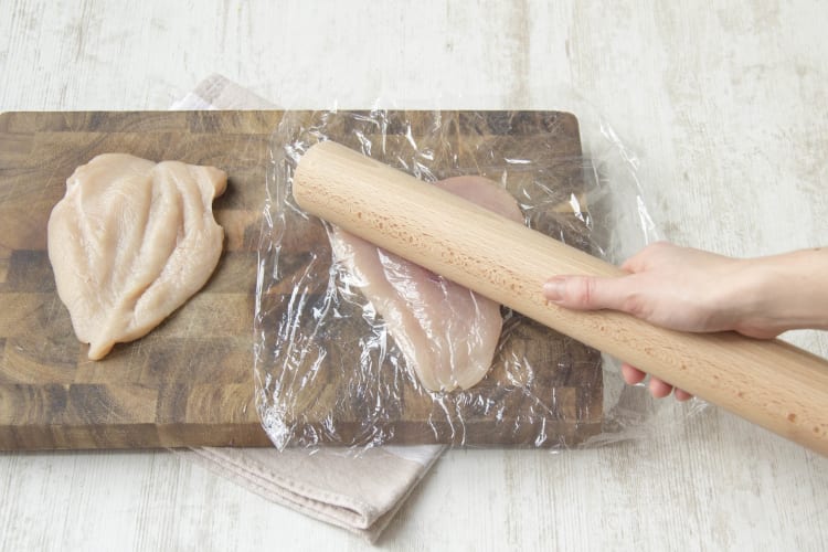 Flatten the chicken breasts