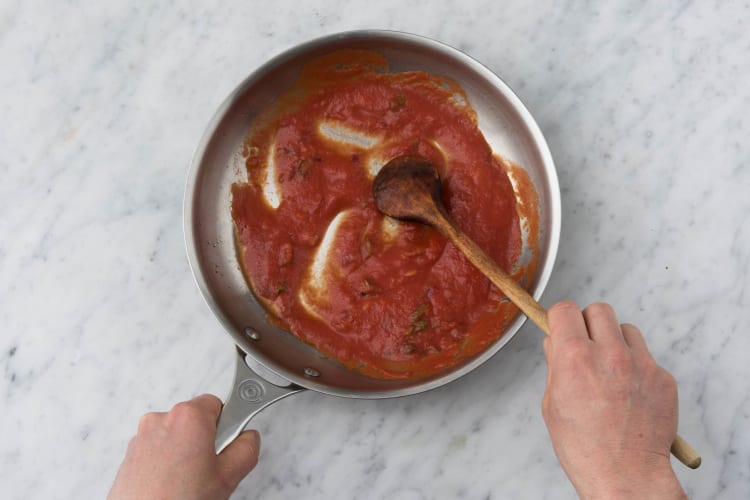 Add in the tomato passata