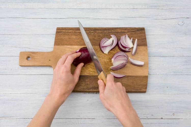 Cut the red onion into wedges