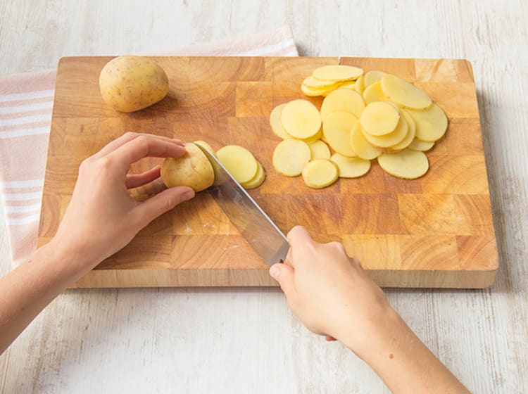 Slice the potatoes very thinly