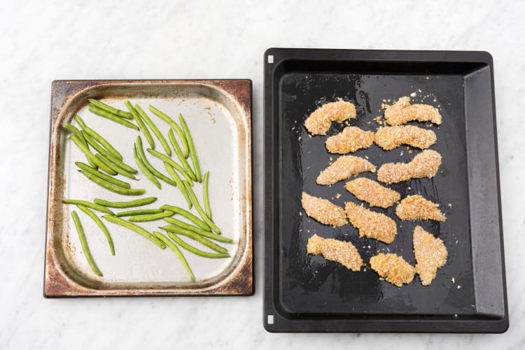 Bake the green beans and chicken strips