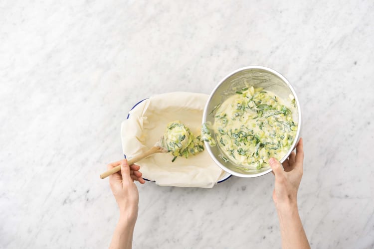 Spoon the silverbeet and ricotta mixture into the centre of the baking dish