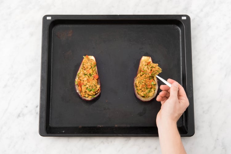 Spoon the crumb mixture into the cooked eggplant shells