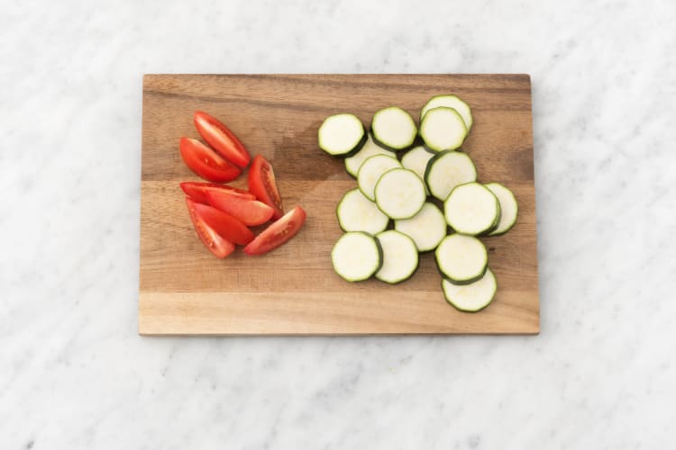 Preheat oven and prep veggies