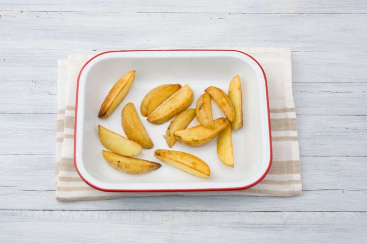 Preheat oven and roast potatoes