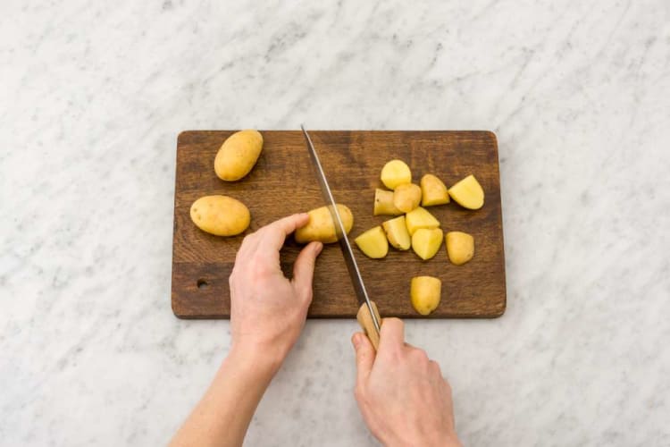 Preheat oven and roast potatoes