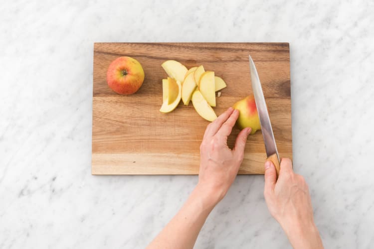 Quarter the apple and finely slice