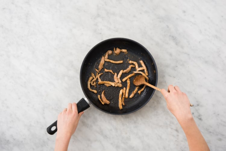 Cook the pork strips