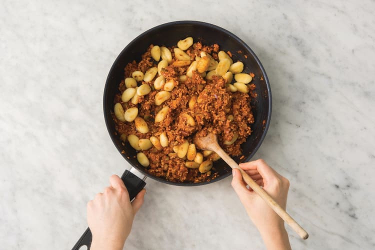 Add the gnocchi to the ragu